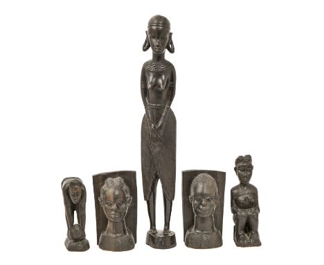 Tribal Art. Three African carved hardwood figures and a pair of bookends, 20th c, 50cm h and smaller  Some very minor splits 