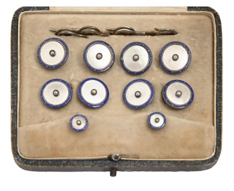 A pearl, mother-of-pearl and silver and blue enamel dress set, c1930, cufflinks 14mm diam, marked SILVER, cased (8)  Lightly 