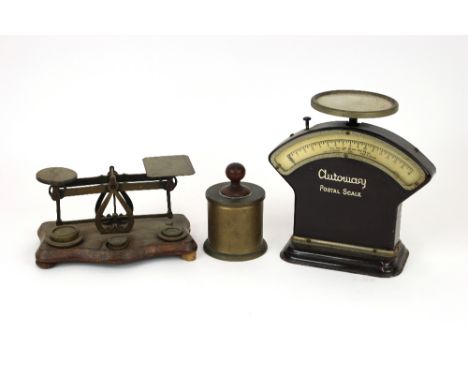 A set of brass postal balance scales, oak serpentine platform with six matched weights, width 20cm; an Autoway postal scale; 