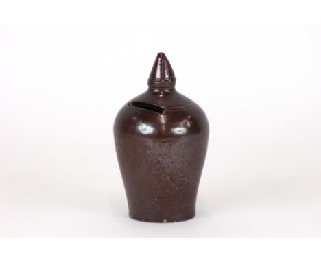 A Nottingham stoneware finial shape moneybox, 19th Century, with an incised band and pointed finial, 16cm