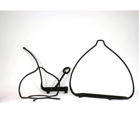 A wrought iron hearth hanger, with twin lugs to the open grille, width 61cm; another smaller, width 36cm and a spit bracket, 