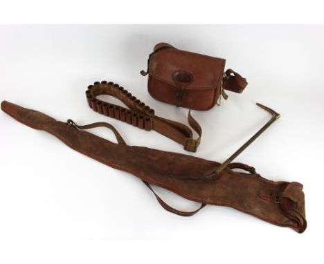 A Victorian riding crop, horn handle, dated 1897; a leather sportsman's bag; a cloth gun case; an ammunition belt, (4)