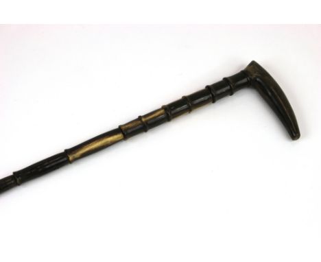 A segmented horn walking stick, with horn handle, 87cm