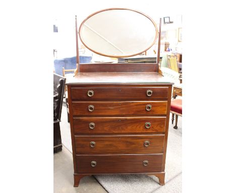 A mahogany dressing chest, oval mirror back, fitted with five graduated long drawers, bracket feet, width 92cm