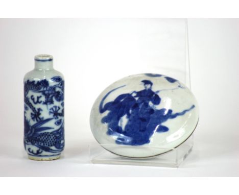 A Chinese blue and white circular box, bearing Kangxi six character mark but later, cushion circular form, decorated with fig