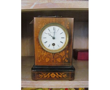 An inlaid clock