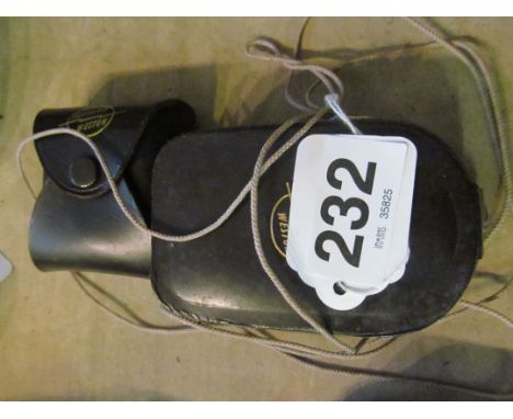 A light meter cased and another item cased