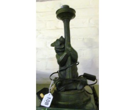 A table lamp in the form of a bear