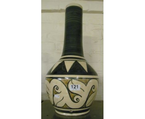 A Mexican pottery vase with hole for lamp cable