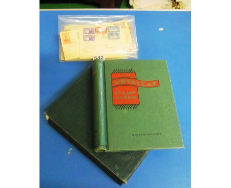 Two Movaleaf stamp albums with Victorian and later low value used stamps mainly from the Commonwealth and packet of early Vic