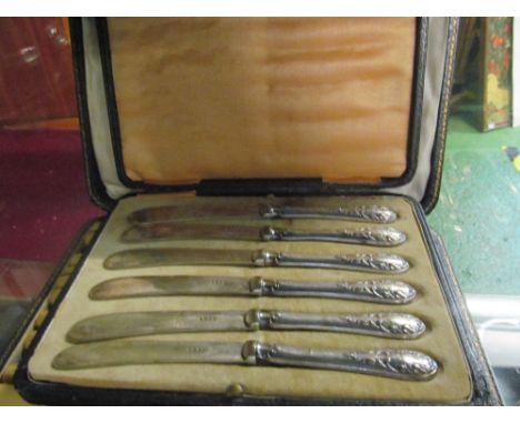 A set of six silver handled knives, fish knives and fork (i.c) and pepper, salt and tray (i.c)