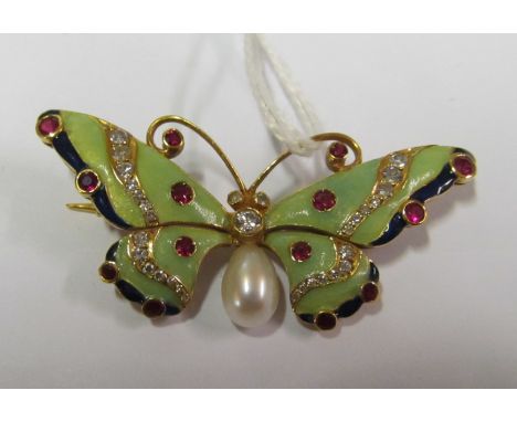 A yellow metal butterfly brooch marked 18k enamel, pearl, diamond and red stone