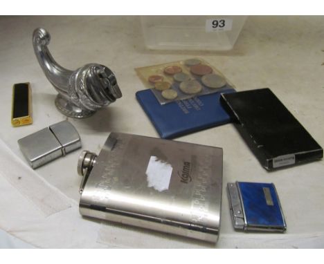 Various lighters, hip flask and a few coins