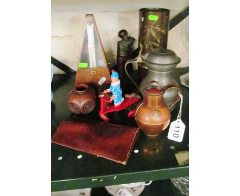 A Metronome, clown on tricycle toy and other items