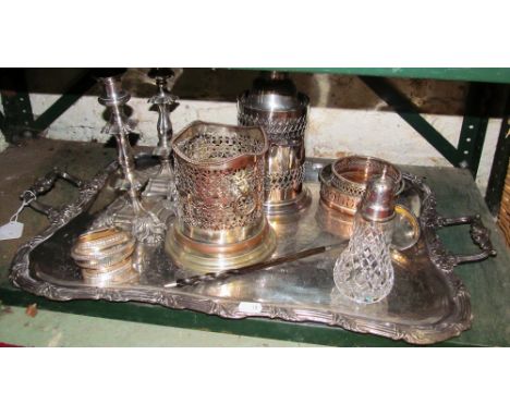 A silver-plated tray, two soda syphons, two wine coasters, pair candlesticks, cocktail shaker, sifter and a toddy ladle (sold