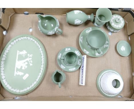 A collection of Wedgwood sage green items to include: night light, tea cup, saucer, coffee can and saucer, jugs etc (12)