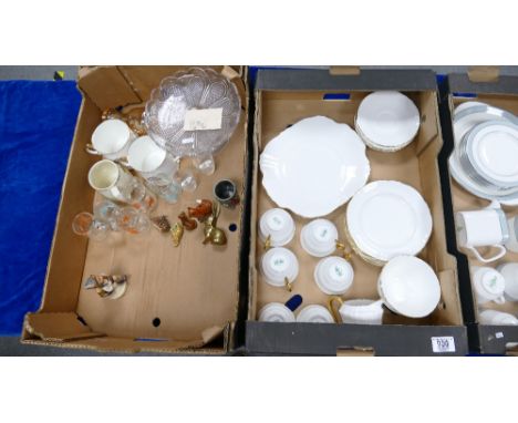 A mixed collection of items to include: Crown Staffordshire Gilded Tea Set: together with Wade, Beswick, Goebel figure and gl