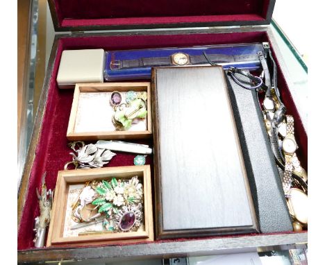 A collection of ladies vintage costume jewellery: including wristwatches, brooches, pendants etc in wood display case.