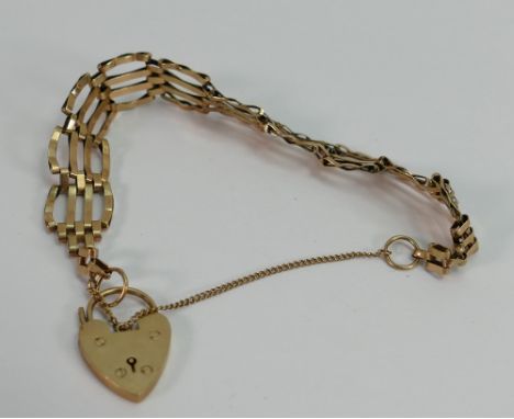 9ct gold ladies gate bracelet: 17.1g.