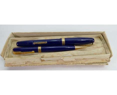 Waterman 515 blue fountain pen & pencil set: Complete with original, albeit distressed, box.  Pen has small blemish, possibly