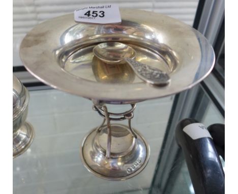 A Birmingham hallmarked silver pedestal dish raised upon three single stems together with a further silver caddy spoon with c