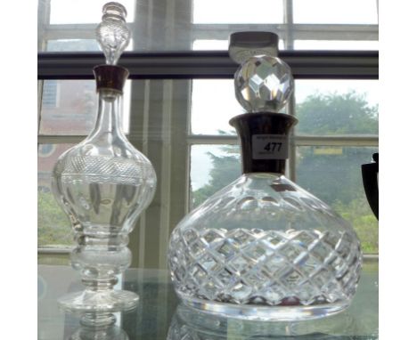 A Birmingham hallmarked silver collared and cut glass bulbous form decanter together with a further Birmingham hallmarked sil