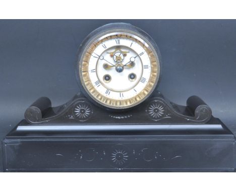 Samuel Marti - A 19th century French slate mantle clock having an open escapement white porcelain enamel chapter ring with ro