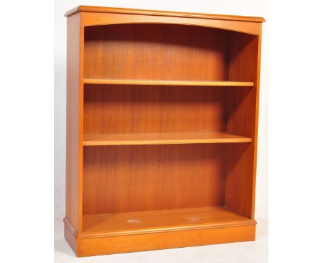 Stagg - British Modern Design - A retro vintage mid 20th century circa 1970s teak wood bookcase having a flared top over a ba