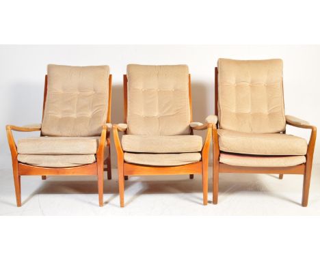A collection of retro vintage mid 20th century Danish inspired teak framed easy / lounge armchairs by Cintique. The chairs ha