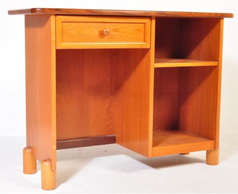 A retro vintage mid 20th century circa. 1960's teak wood telephone table and desk combination having rounded edges over a sin