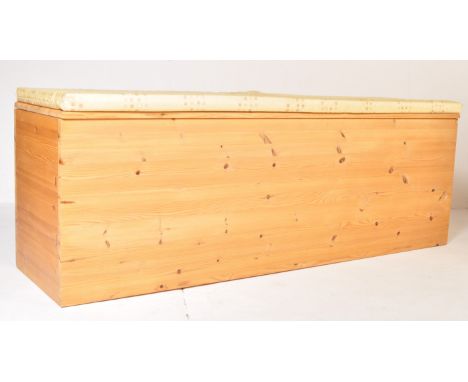 A large vintage 20th century pine blanket of cuboid form having a hinged lid opening to reveal a spacious interior.&nbsp;Meas