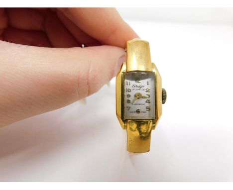A gold plated vintage Arugo Swiss made ladies bangle watch. Diameter 4.8cm. 