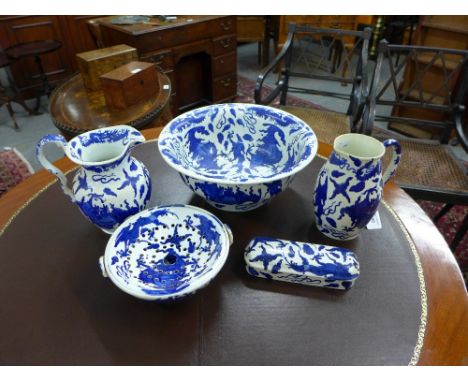 Spode blue and white toilet set comprising a basin, two jugs, rectangular jar and cover, bowl and drainer, all with impressed