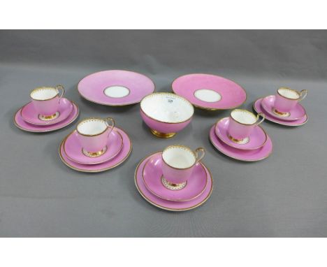 19th century pink glazed porcelain teaset, comprising nine cups, twelve saucers, twelve side plates, two comports and sugar b