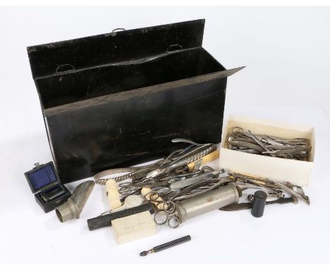 Reynolds &amp; Branson Ltd Makers Leeds black painted tin containing a quantity of medical tools, syringes, scissors, clamps,