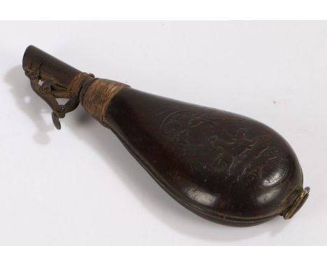 19th century powder flask the leather body with raised hunting scene above the adjustable steel spout, 22cm long