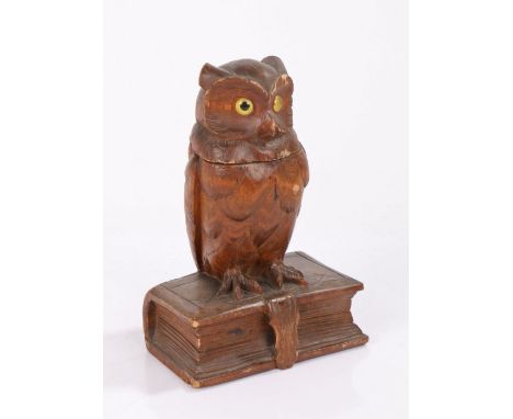 Black Forest style inkwell, modelled as an owl perched on a book, the hinged lid opening to reveal a covered inkwell, 10.5cm 