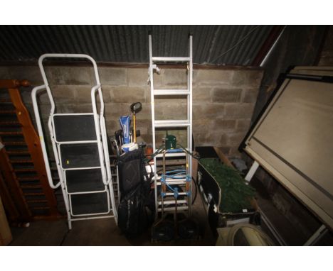 An aluminium Abru three way ladder together with a folding metal sack barrow and a Christmas tree stand