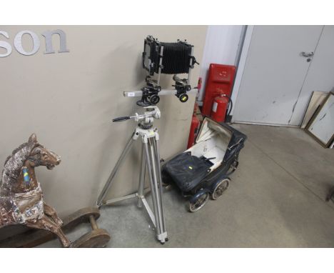 A vintage Devon camera on tripod 