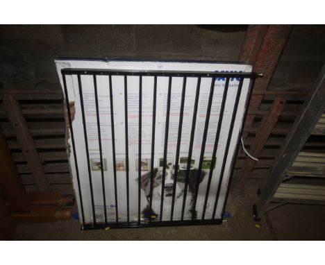 A Savic extending pet gate with original box 