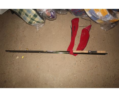 A three piece Penn Progression 11' fly fishing rod with carry bag
