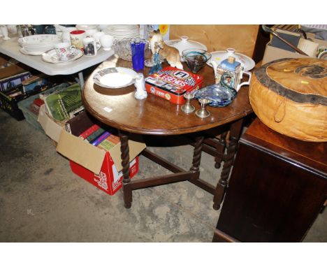 An oak barley twist gate leg table