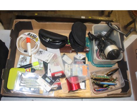 A quantity of fishing related items to include a Leader LBS/M fishing reel; various break away leads; floats; a spool of Nan-