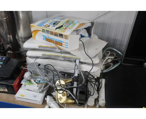 A Nintendo Wii console with various accessories
