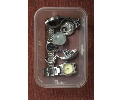 A box of wrist watches and key ring