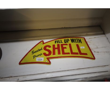 A painted cast iron sign in the form of an arrow "Fill Up With Shell" (161)