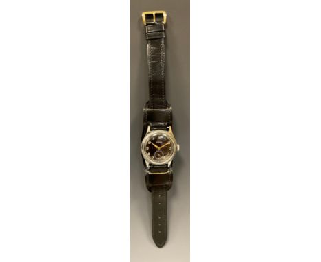 A World War II period Junghans military wristwatch, 32mm case with black dial, Arabic numerals, subsidiary seconds, luminous 