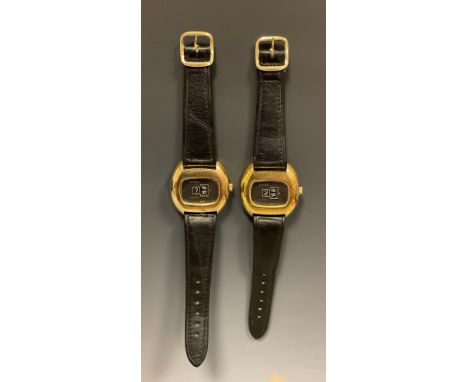 Sanford - two digital jump hour 1970s wristwatches, brushed gilt metal cases, graphite grey apertures, hour and minutes jump 