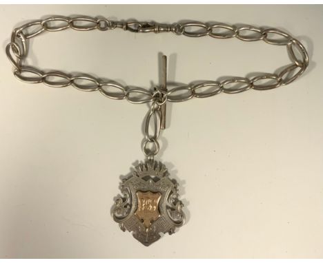 A Victorian silver Albert Chain, Tbar, twisting links, clip terminals, large silver suspension medal, mixed marks, 37cm long,