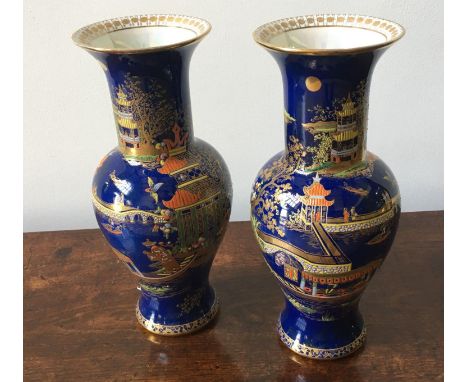 PAIR OF CARLTONWARE COBALT BLUE LUSTRE GLAZE BOLSTER VASES, decorated with pagodas 